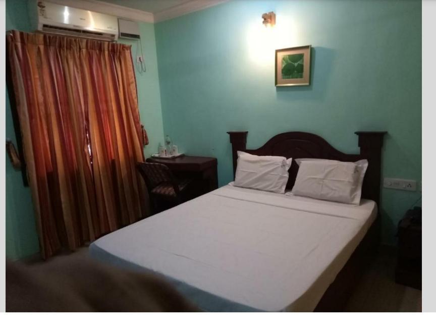 Hotel Priya Chengannur Quarto foto